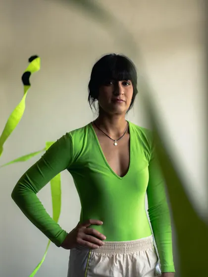 Playing with light and shadow in the studio to create a more artistic and moody portrait for the fitness campaign.