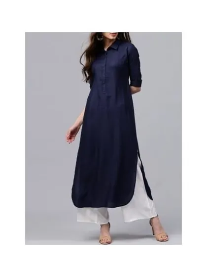 A well-stitched shirt-collar kurti is a wardrobe essential. This navy blue piece is tailored for a clean, professional look, paired with comfortable white palazzo pants. I focus on creating sharp lines and a perfect fit for your everyday and office wear.
