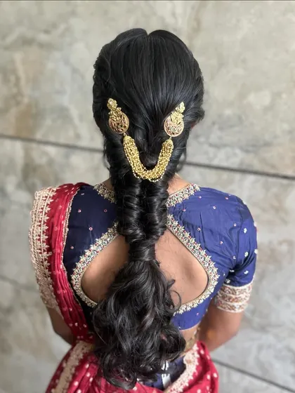 The full back view, showcasing the beautiful texture and flow of this half-braided style.
