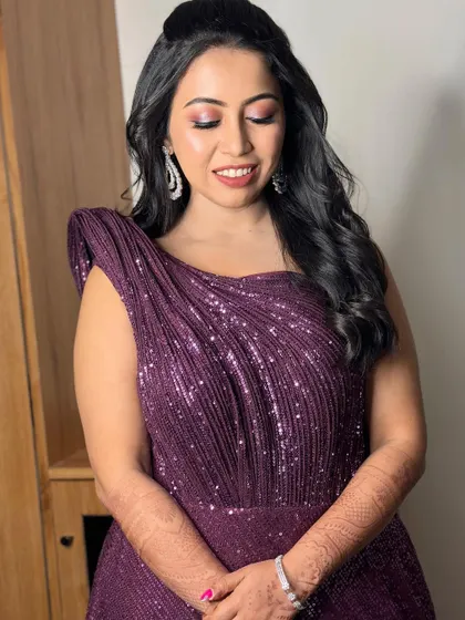 A close-up of the bride's happy expression. The makeup is designed to be vibrant and fun, perfect for a cocktail party.
