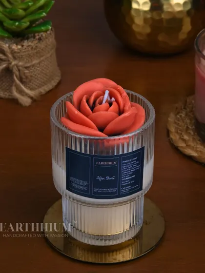 A beautiful coral-colored rose in my 'After Dark' ribbed glass votive. The warm color and gentle light create a truly cozy vibe.