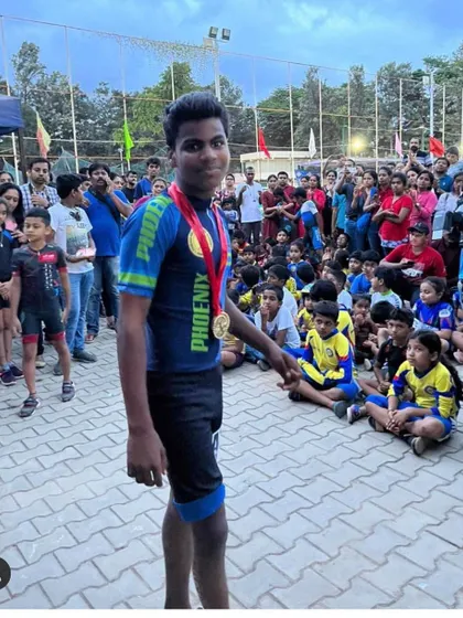 One of our academy's athletes after winning two gold medals in a roller skating championship. This demonstrates our capability in managing and supporting athletes across different sporting disciplines.