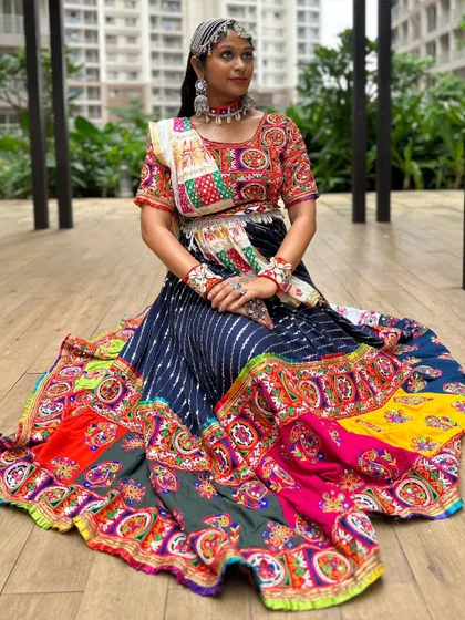 The full lehenga skirt is a masterpiece of color and patchwork, creating a stunning visual when spread out.