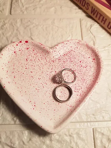 Our heart tray with a delicate red splatter. It's a simple yet beautiful piece that makes a thoughtful gift for Mother's Day or any special occasion.