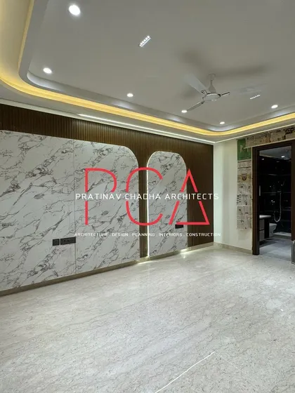 A duplicate of image 163, highlighting the unique, marble-finish wardrobe design in the Vasant Kunj bedroom.