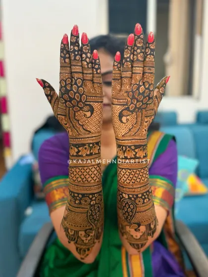 The full view of this peacock special bridal henna. The back of the hands features bold peacock figures that are absolutely stunning.