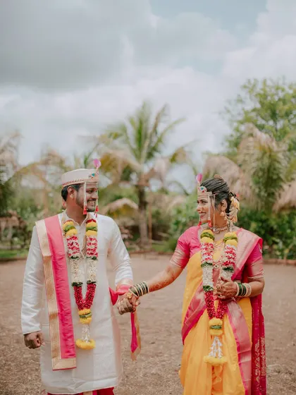 The couple takes their first walk together as husband and wife.