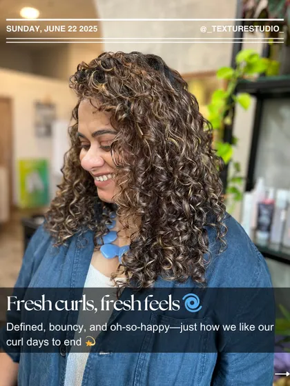Fresh curls, fresh feels. These curls are defined, bouncy, and oh-so-happy after a color service and styling session.