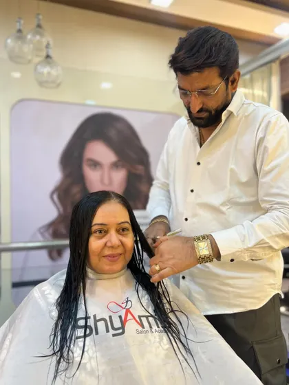 The ultimate hair revival for actress Neelu Vaghela. This shot shows our expert at work, giving her a fresh cut.