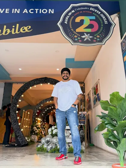 Posing in front of the event branding for Avalon's 25th anniversary. I enjoy being part of these major corporate celebrations and ensuring the party is a huge success.
