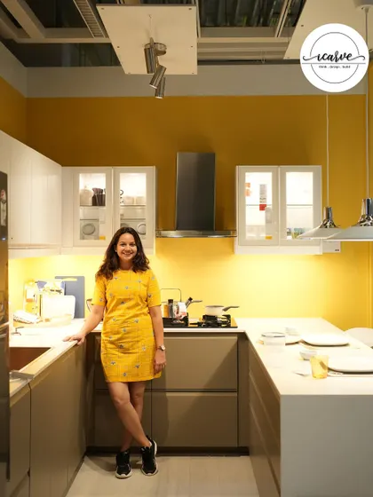 Here I am in a beautiful display kitchen, gathering inspiration for our next project.