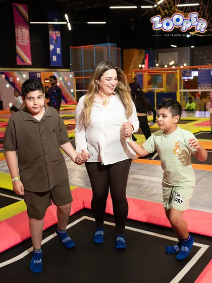 A mother and her sons enjoy some quality time on the trampolines. I love seeing families bond and have fun together.