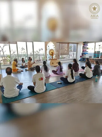 A philosophy session in progress. Our training is deeply rooted in the ancient texts, and we dedicate ample time to satsang to discuss and absorb the wisdom of the Yoga Sutras and Bhagavad Gita.
