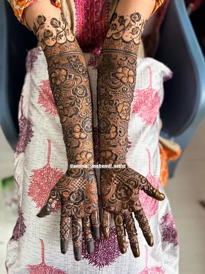 This is an example of my signature full-arm floral mehendi. I love creating dense, intricate patterns with elements like roses, paisleys, and detailed fillers to give you a rich and traditional look for any celebration.