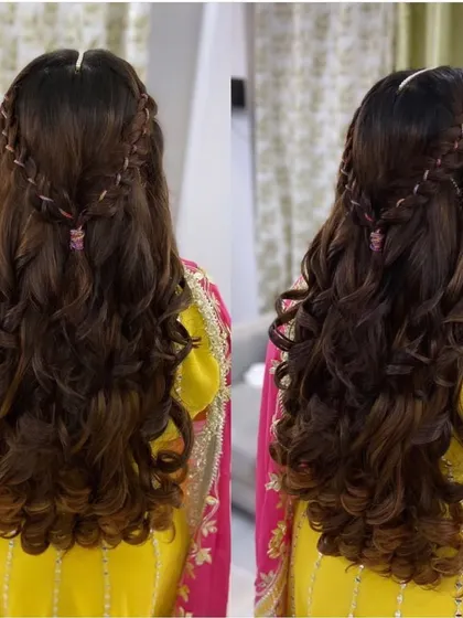 Mehndi hair on fleek. A beautiful and intricate braided hairstyle with soft curls, perfect for a Mehndi or Sangeet function.