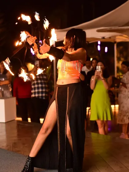 Another angle from the Oktoberfest performance, showing the flow of the fire snakes as I move. Each performance is a dance between me and the flames.