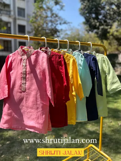 I believe in offering a rainbow of choices. Here is my collection of plain linen kurtas with embroidered necklines, available in a variety of vibrant and pastel colors to suit any occasion.