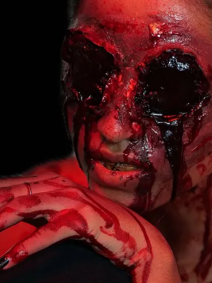A chilling "missing eye" SFX look. These images showcase the graphic and gory details of horror makeup, a specialized skill I teach for film and Halloween projects.