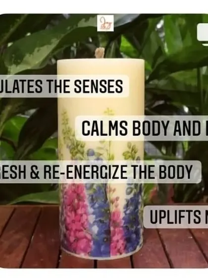 A beautiful floral pillar candle representing the uplifting and re-energizing benefits of certain fragrances. Our candles are designed to not only smell good but also make you feel good.