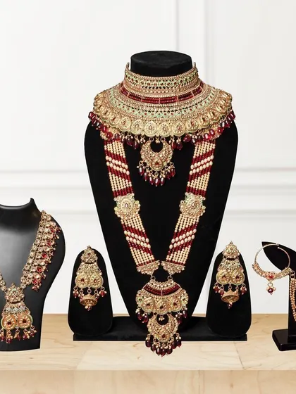 A collection of bridal jewelry sets displayed for a catalog or website banner. This image showcases the variety available, encouraging customers to browse the entire collection.