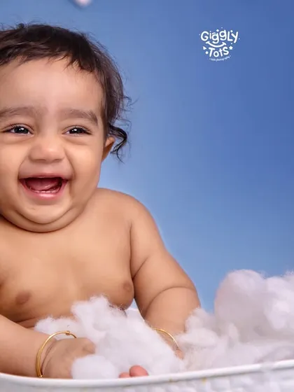 A happy baby's laugh is the most beautiful sound. My fun bathtub sessions are all about capturing those priceless, splashy giggles and expressions of pure delight.