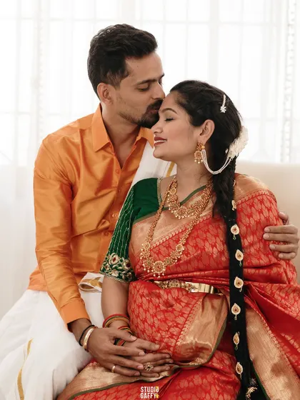 Celebrating heritage and new beginnings. This couple chose a traditional South Indian theme for their maternity shoot, complete with rich silks and cultural details, creating a truly meaningful portrait.