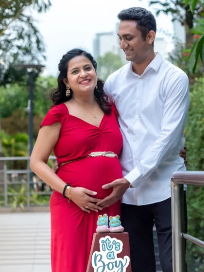An outdoor maternity portrait of a couple expecting a boy. We provide beautiful maternity photoshoots in natural settings around Bangalore.