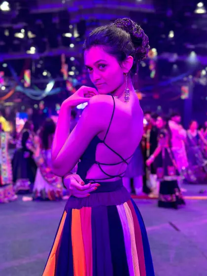 Posing during a Garba night. My choreography includes moments of flair and attitude, allowing dancers to express their personality.