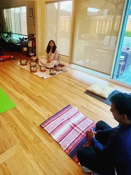 One of my graduates leading a sound bath in a bright, welcoming space. I empower my students with the knowledge and confidence to create their own successful wellness practices and studios.