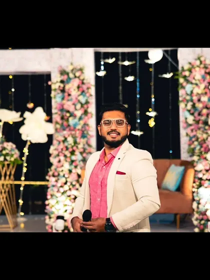 A posed shot against a beautiful floral backdrop. My attitude is as important as my talent.
