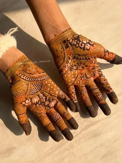 The beautiful stain of a detailed Indian mehndi design. The contrast between the fine lines and the bold-filled areas is what makes this style so captivating.