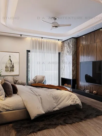 A bedroom design for a Rajouri Garden project, featuring a fireplace integrated into a wooden and marble TV wall, creating a cozy and luxurious ambiance.