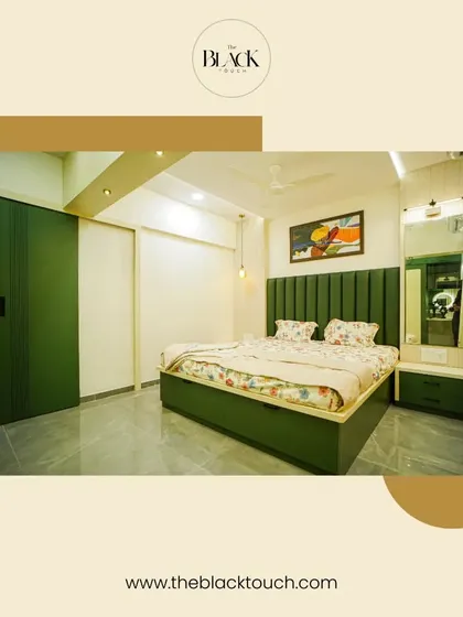 A bedroom designed with a refreshing green theme. The upholstered green bed and matching wardrobe create a cohesive and calming environment, perfect for a nature-inspired retreat.