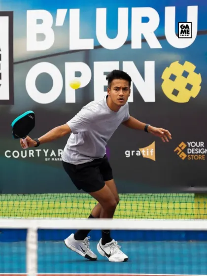 A player mid-swing during a competitive match at the B'luru Open. The focus and determination here capture the spirit of our tournaments.