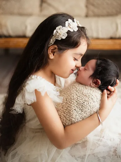 The sweetest kiss for a new baby brother. Capturing the beginning of a lifelong bond between siblings is one of the most rewarding parts of my job.