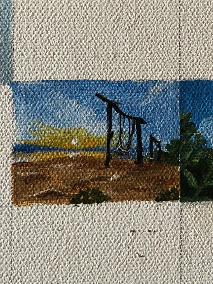 A mini-painting of a swing on a beach at dusk.