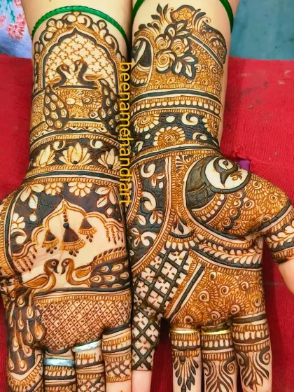 Another view of the intricate design with peacocks and swans. The symmetry and detail in this piece are what make it special.