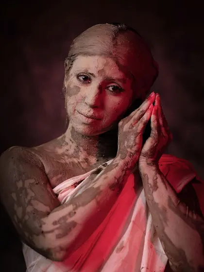 A pose reflecting contemplation during the initial phase of the goddess's creation. The story of Durga's birth, formed from the combined powers of the gods, is a powerful narrative of strength.