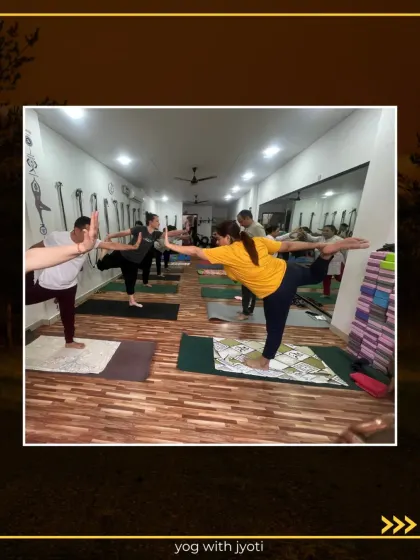 The entire class practices Natarajasana, each student finding their own expression of the pose.