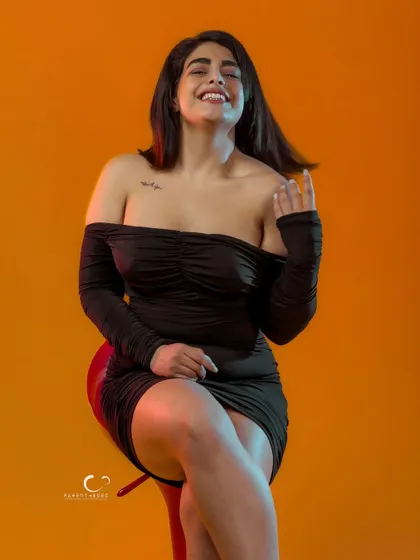 A moment of pure joy and laughter. This shot proves that even in a high-fashion setup, authentic emotion is the most beautiful thing to capture.