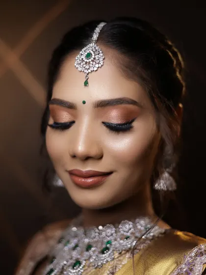 The eyes tell a story. Here, you can see the detailed eye makeup for a Muhurtham bride, a key focus in our advanced makeup lessons.