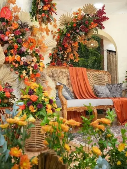 A closer view of the autumn-themed floral arrangements. I layered different flowers and dried elements to create a lush, textured look that is both unique and elegant.
