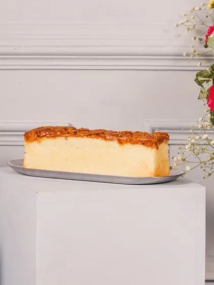 A simple yet elegant almond loaf cake, a comforting and delicious treat that we often include in our bespoke festive hampers.
