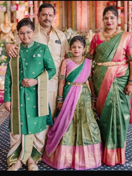 It’s a joy to dress the entire family. Here, I designed a set of coordinated outfits in shades of green and cream, creating a cohesive and elegant look for this beautiful family at a wedding.