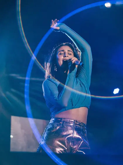 A magical moment on stage. The light trail effect in this photo adds to the electric energy of Dhvani's performance.