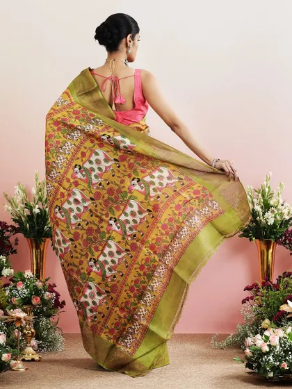 The back view of the Pichwai saree, showing the full expanse of the beautiful printed pallu.