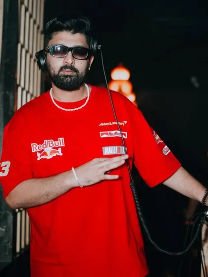 A close-up from a high-energy night at Badmaash. The Red Bull shirt says it all, we're giving the party wings tonight.