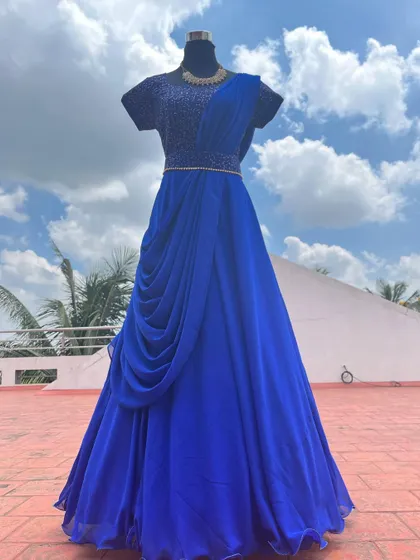 The beautiful drape and rich color make this gown a showstopper.