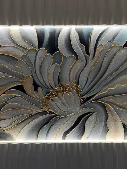 This simple but elegant flower painting was designed to enhance this space with coordinated colors. The backlighting makes it glow.