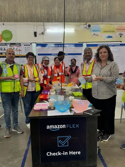 The Amazon Flex team posing with the soaps they created during our workshop. It's always rewarding to see participants enjoying the hands-on experience of making their own natural skincare products.